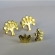 Brinco Duo de Árvore e Borboleta Banhado em Ouro 18k - Dourado