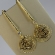 Brinco Médio De Fio Trabalhado e Flor Vazada Banhado em Ouro 18k - Dourado
